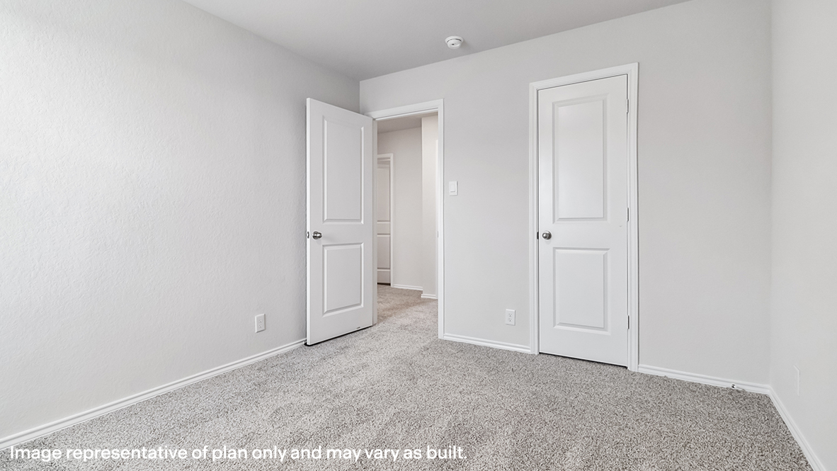 Secondary bedroom closet with shelving.