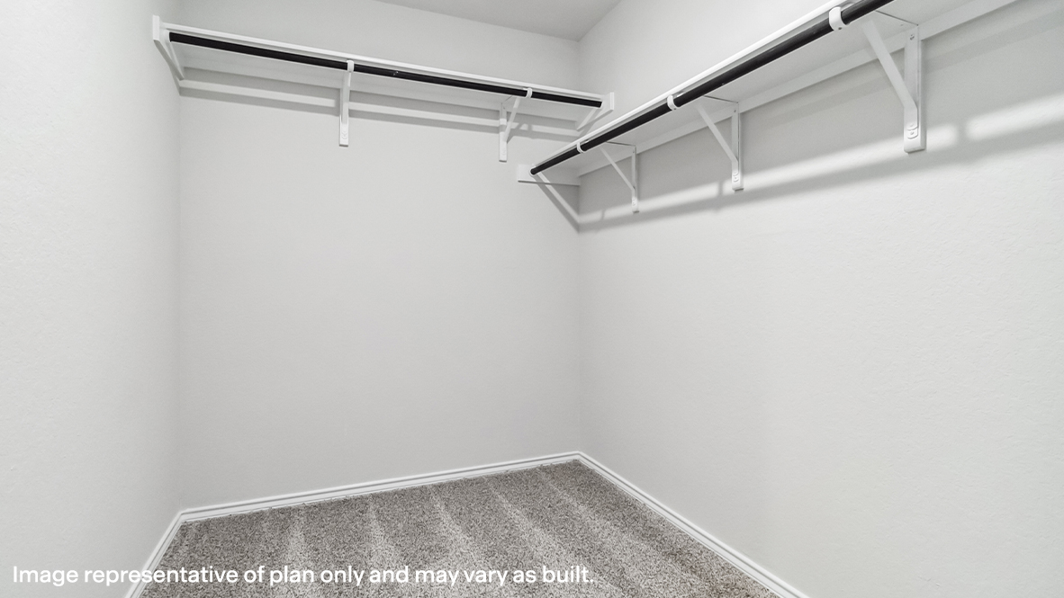 Secondary bedroom closet with shelving.