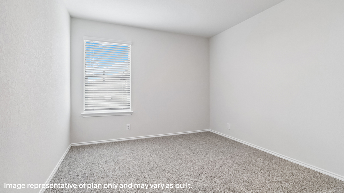 Fourth bedroom with carpet, window and closet.