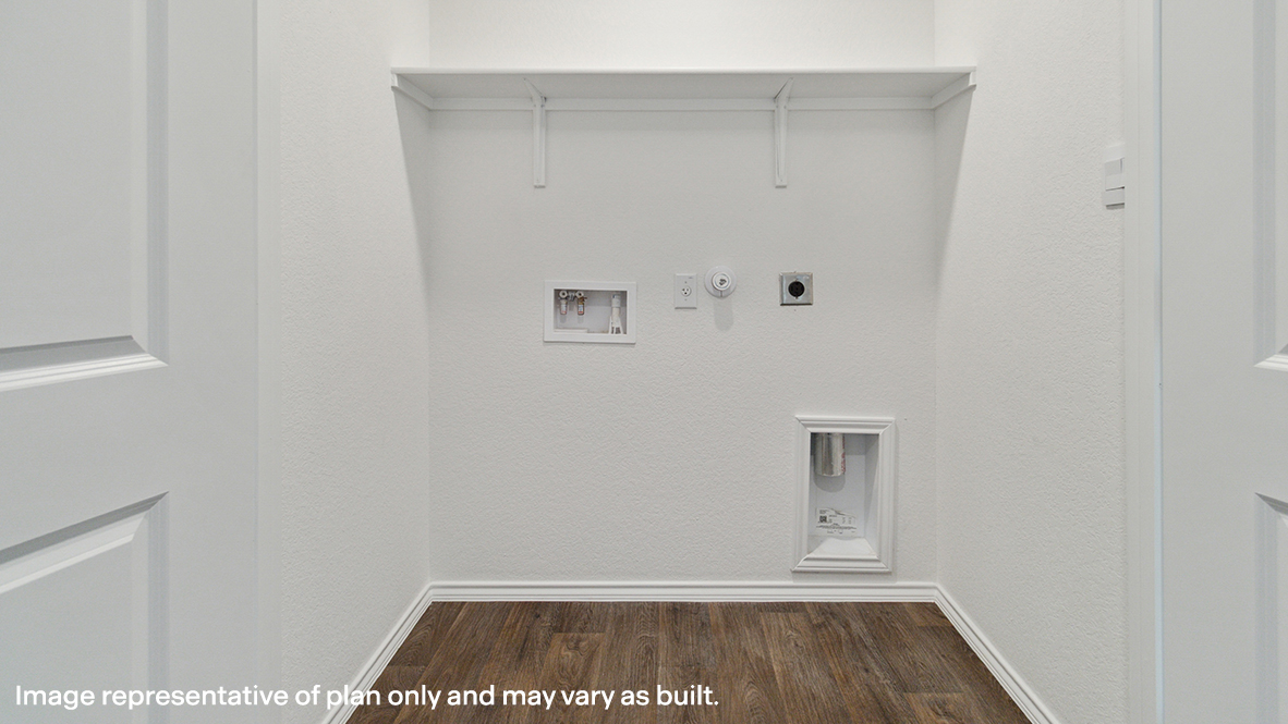 Laundry room with built in shelf.