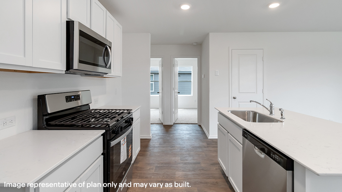 Kitchen with stainless steel appliances.