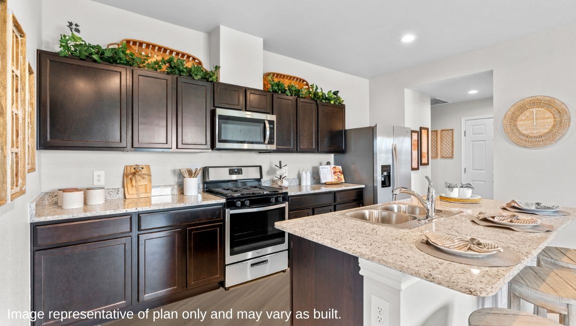 kitchen with stainless steel appliances and large kitchen island