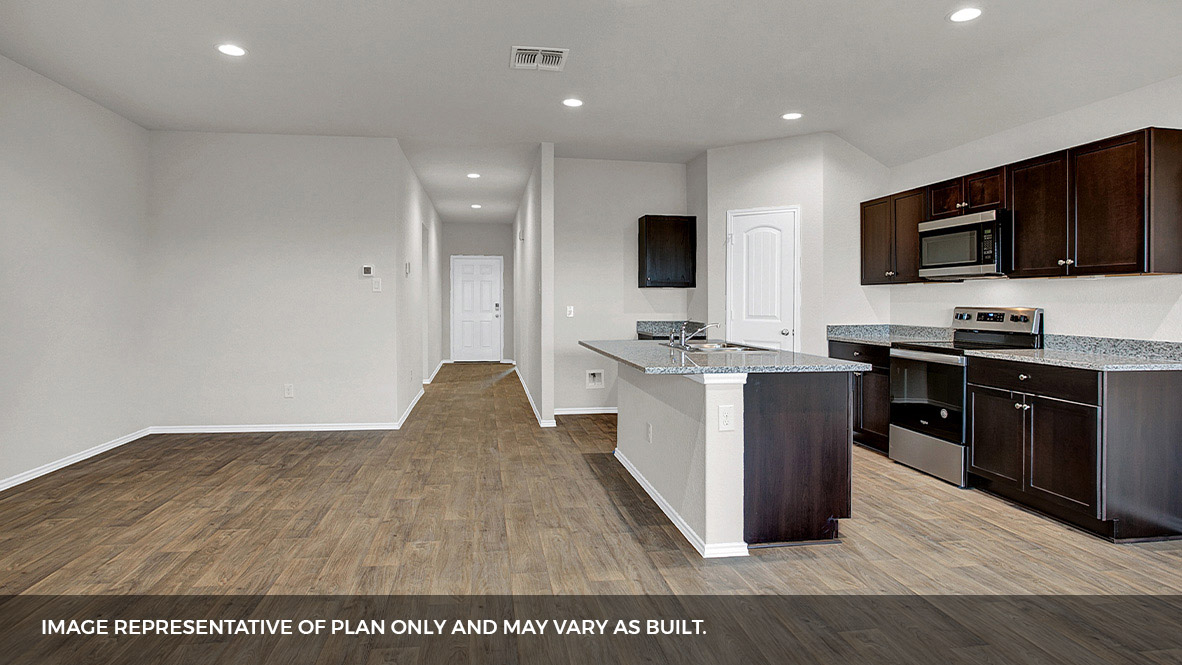 entry leading to combined living area and kitchen