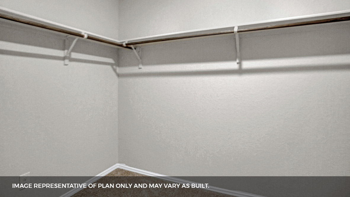 primary bedroom walk in closet