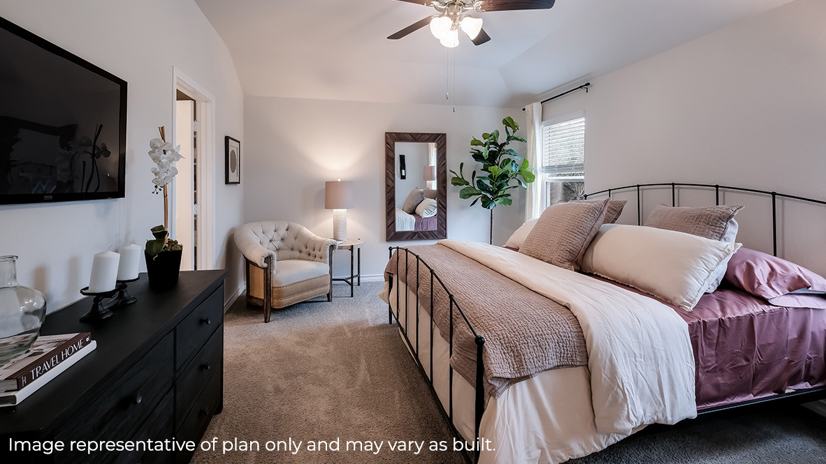 primary bedroom with quality carpet flooring