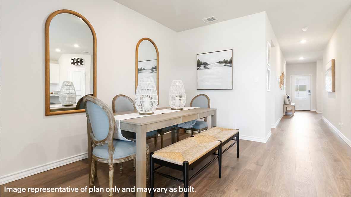 open concept dining area and entry to home