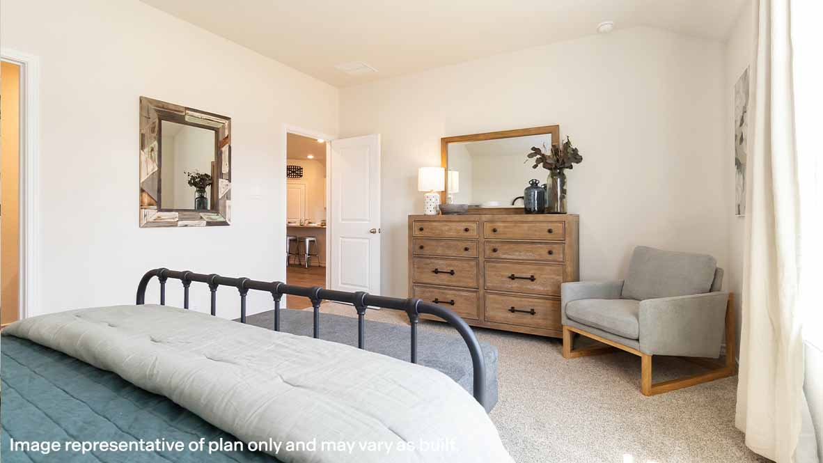 spacious primary bedroom with ensuite bathroom