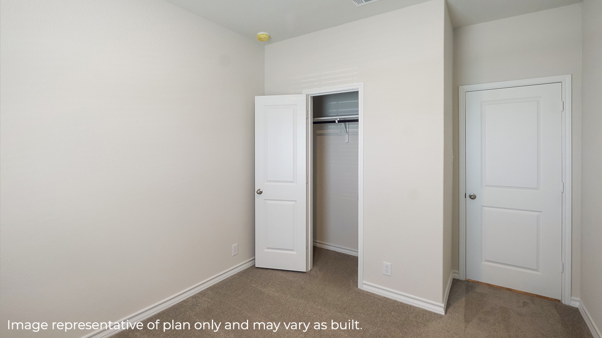 secondary bedroom with closet