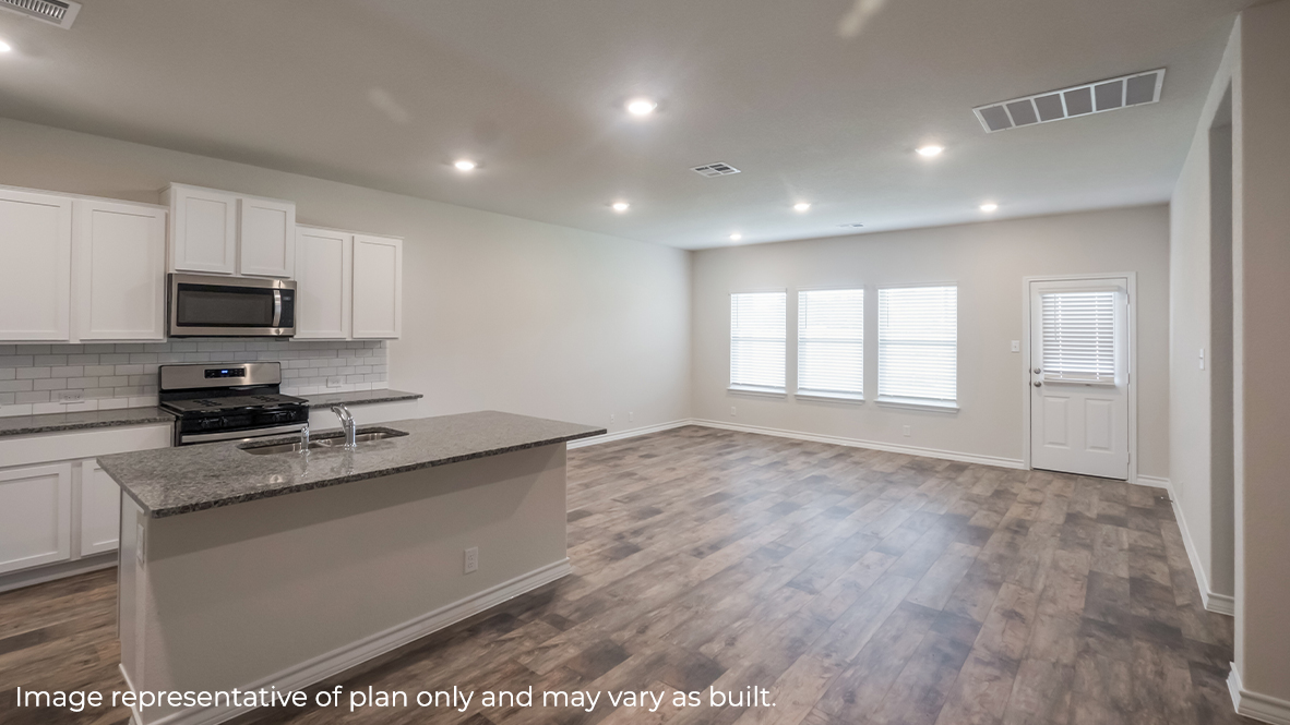 open concept kitchen, dining area and living room