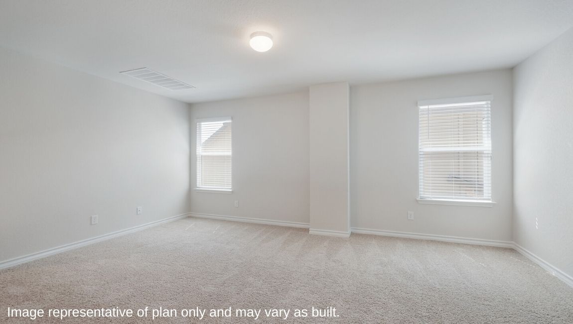 Loft or game room with quality carpet flooring and large windows providing natural light.