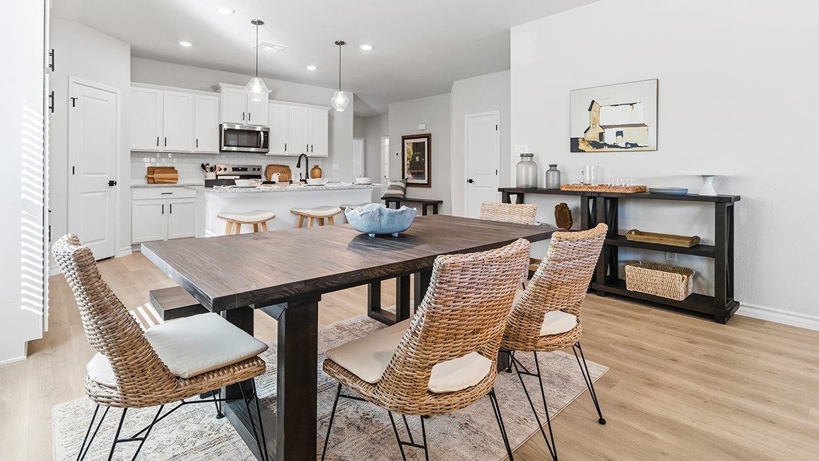 open concept kitchen and dining area