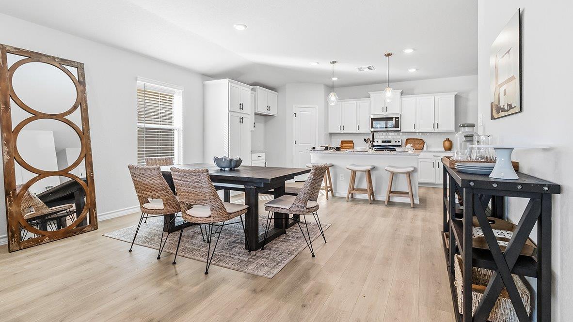 open concept kitchen and dining area