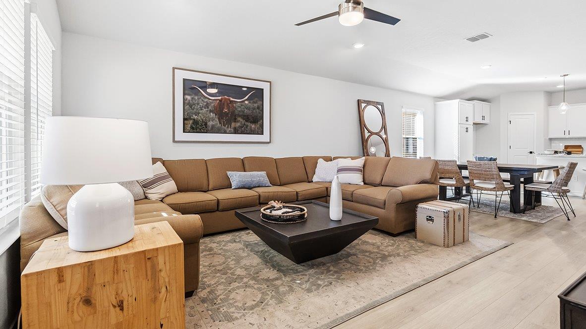 open concept living, dining and kitchen