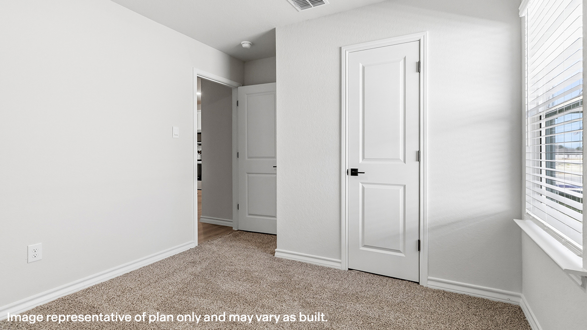 secondary bedroom with closet