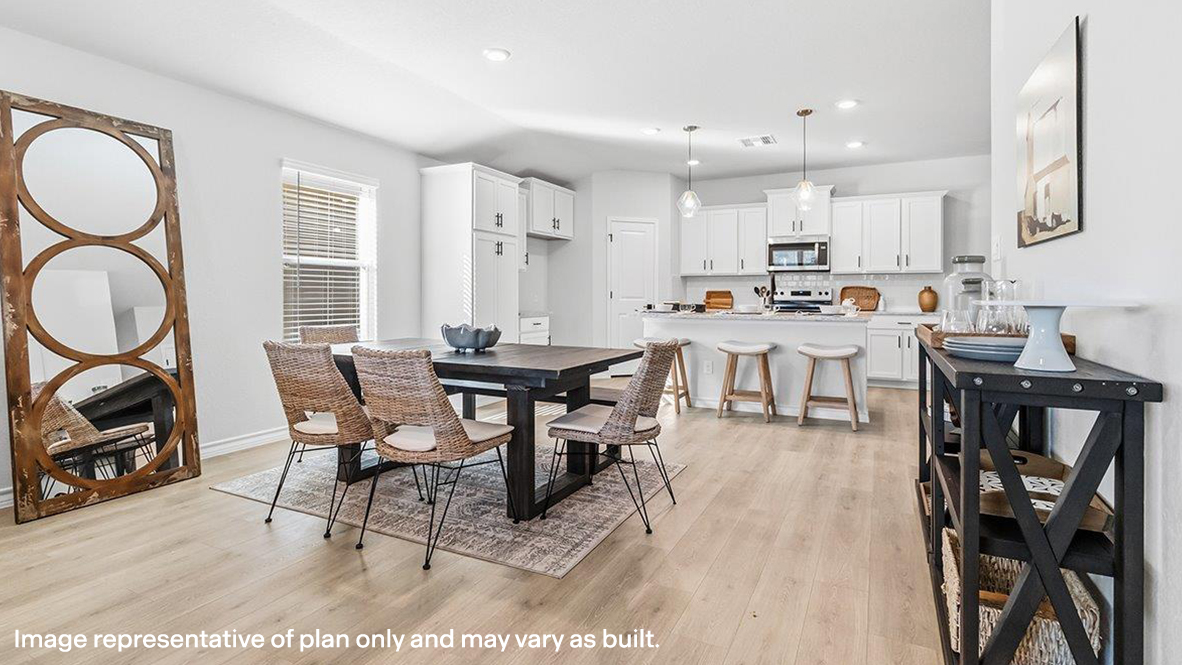 open concept dining area and kitchen with hard surface flooring