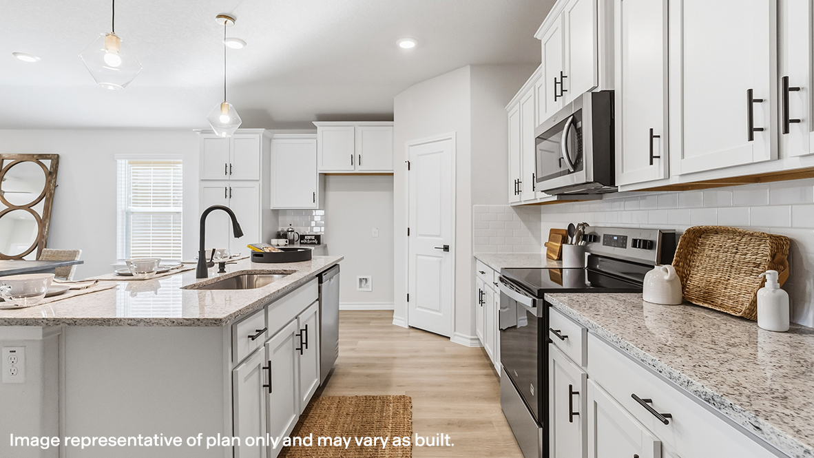 kitchen with quartz or granite countertops and plenty of cabinetry and storage