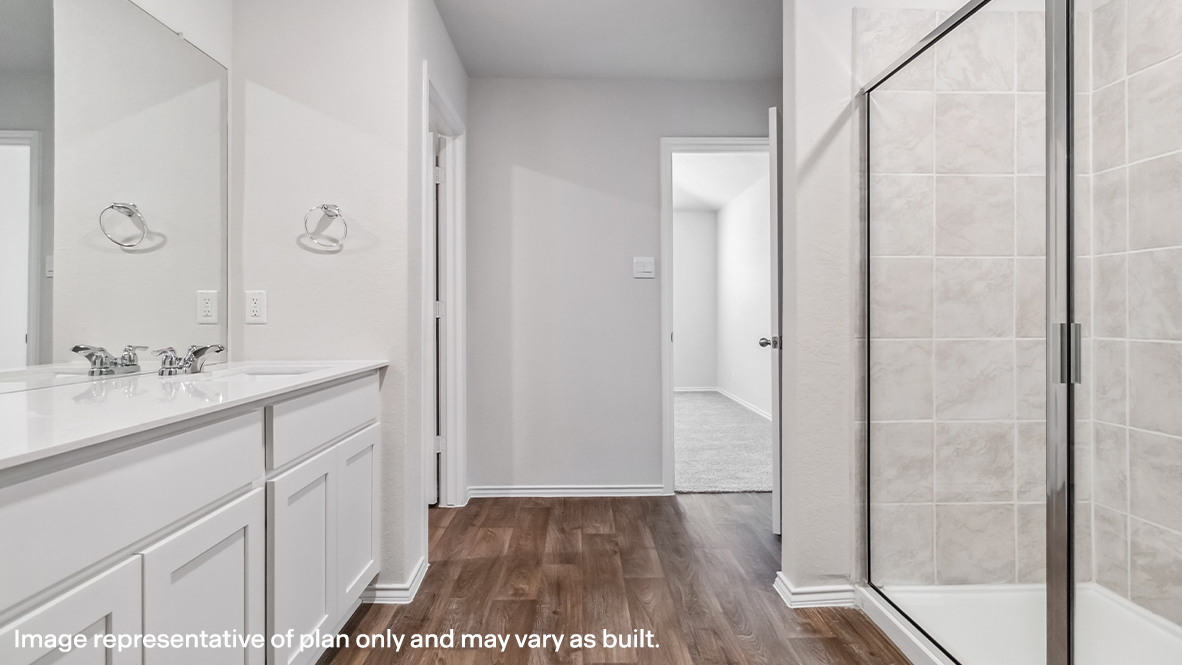 Primary bathroom with walk-in shower and closet.