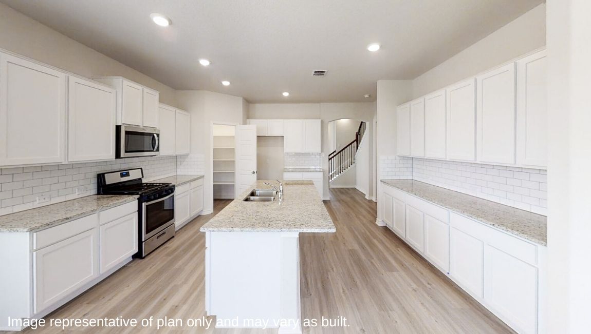 open concept kitchen with hard surface flooring