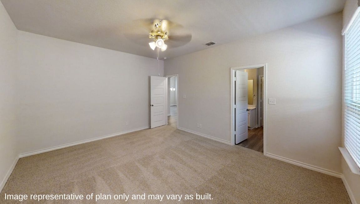 primary bedroom with quality carpet