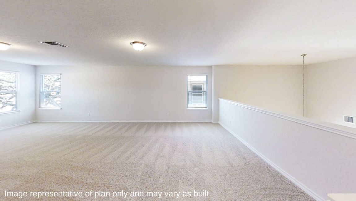 spacious open concept loft with quality carpet