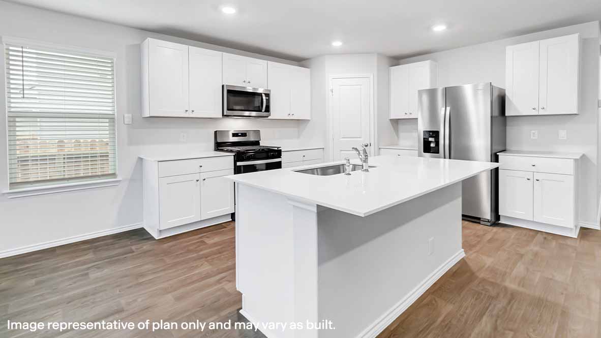spacious kitchen with breakfast bar and plenty of counterspace