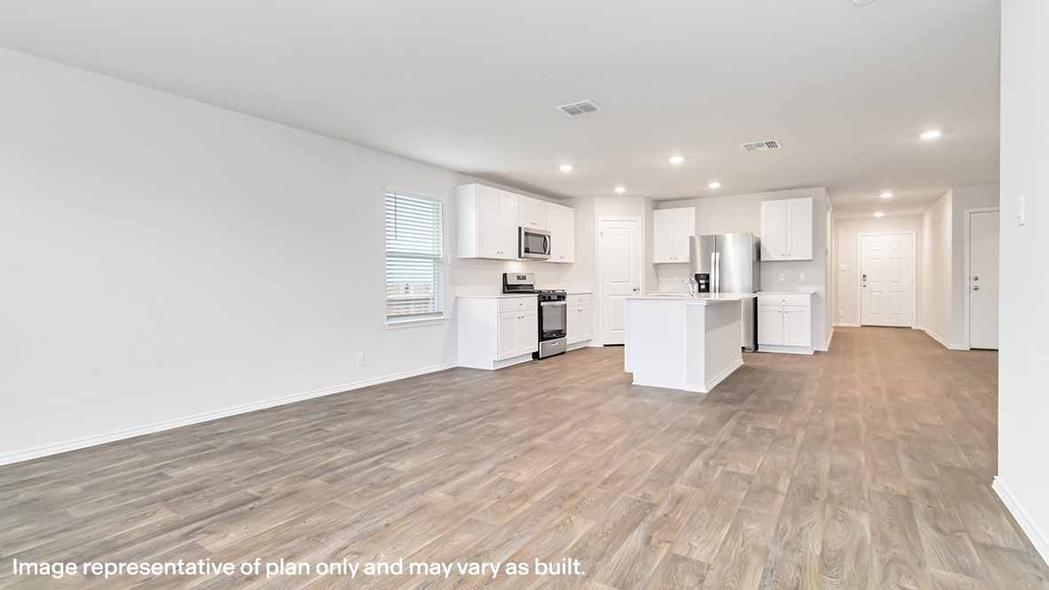 open concept living and dining area with hard surface flooring and windows