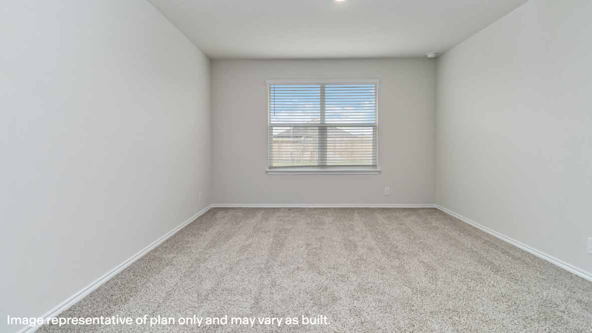 spacious primary bedroom with ensuite