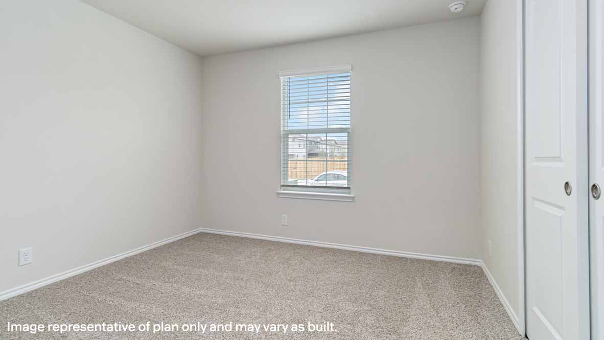 spacious secondar bedroom with window