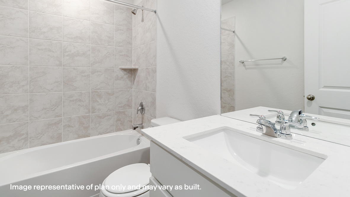 Second full bathroom with combined bathtub and shower, toilet and single vanity sink.