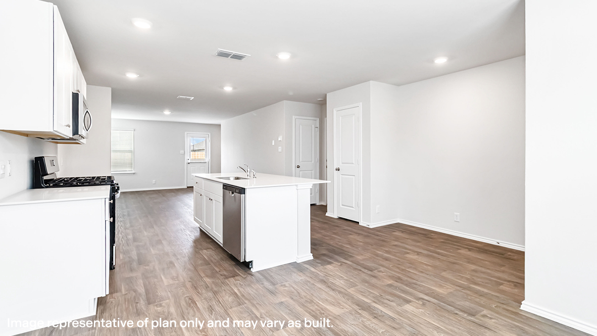 dining area flowing into kitchen and living room