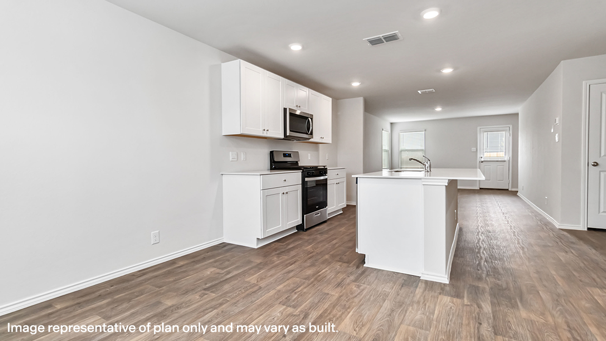 dining area flowing into kitchen and living room
