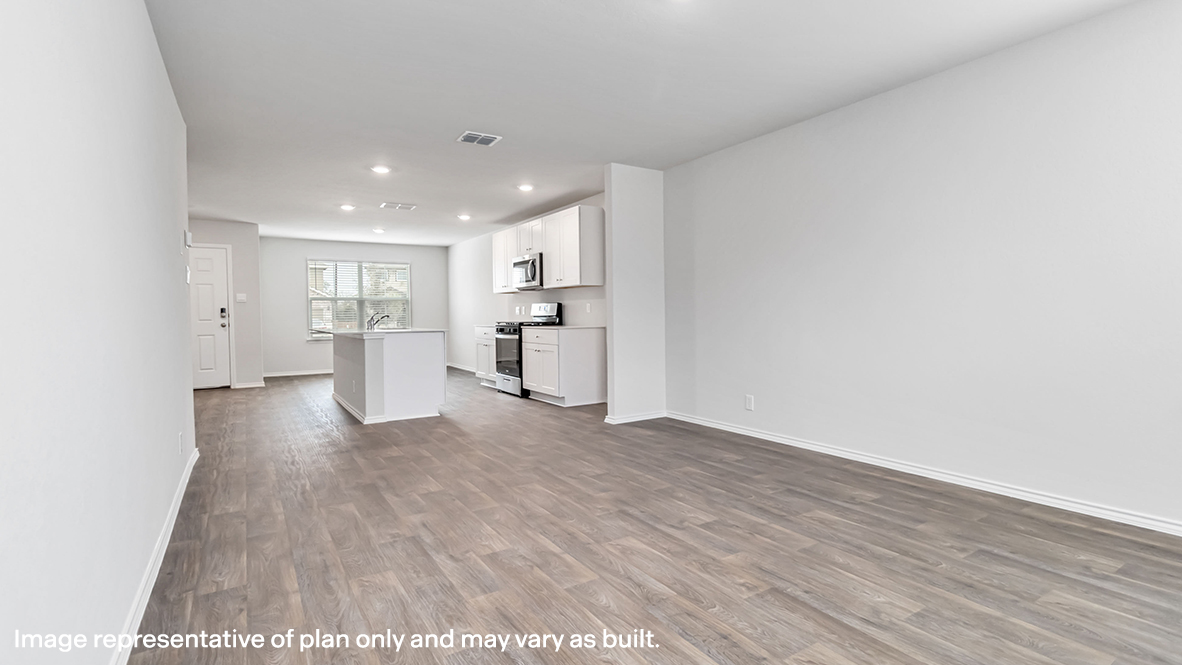 living room flowing into open concept kitchen and dining area