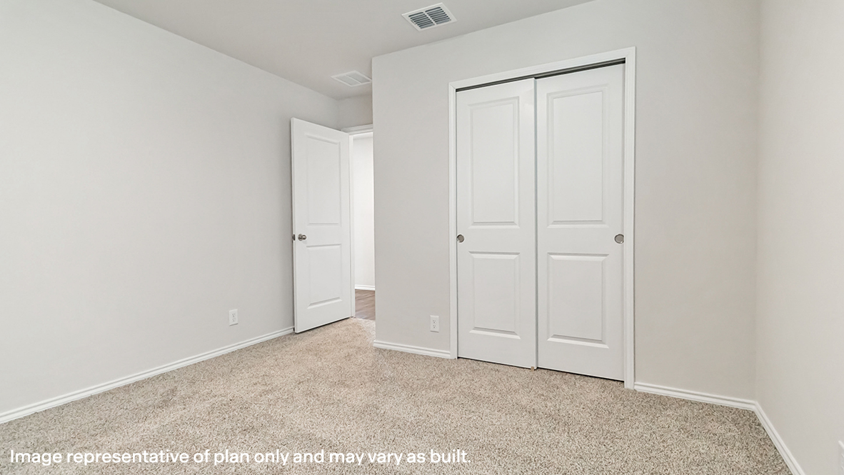 secondary bedroom with closet