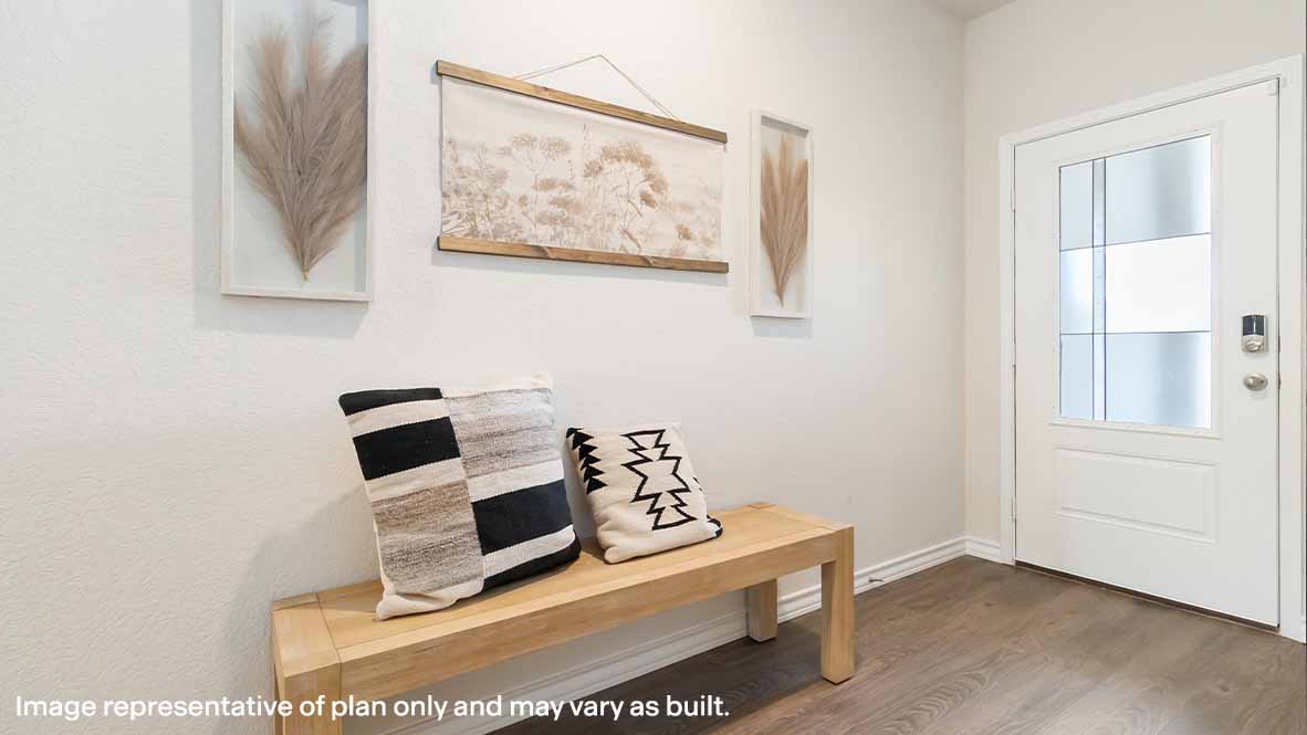 entry way to home with hard surface flooring