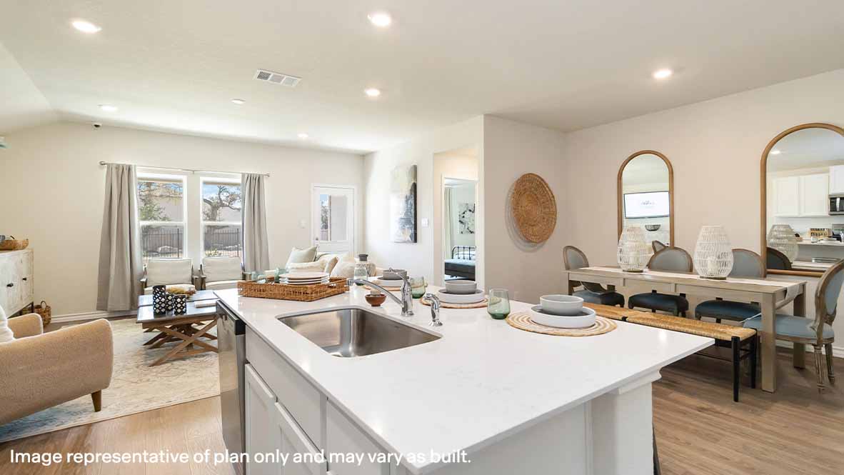 open concept kitchen,l dining and living area