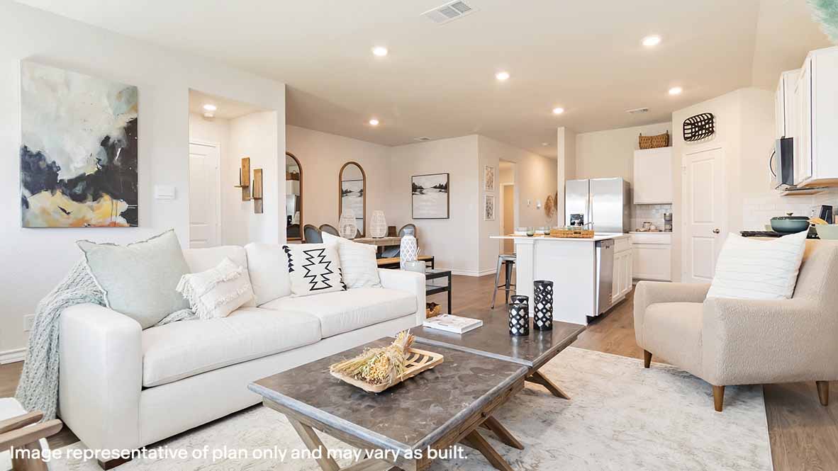 open concept living area overlooking dining area and kitchen