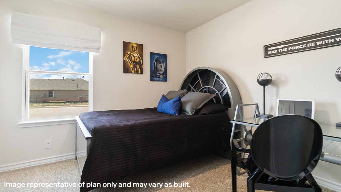 spacious secondary bedroom with window and quality carpet