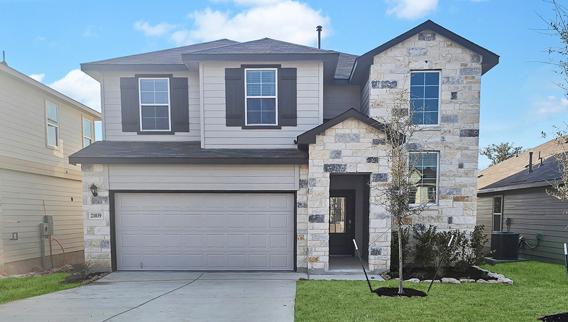 21039 gravel keep, 2 story home with 2 car garage and stone front exterior