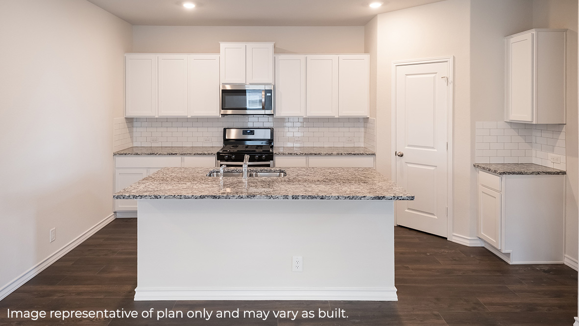 kitchen with stainless steel appliances, quartz or granite countertops, subway tile backsplash and corner pantry.