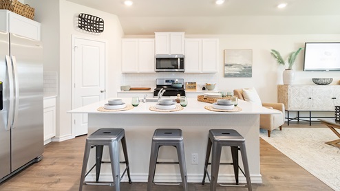 spacious kitchen island with ear-in bar seating