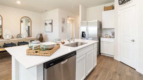 spacious kitchen island with farmhouse sink