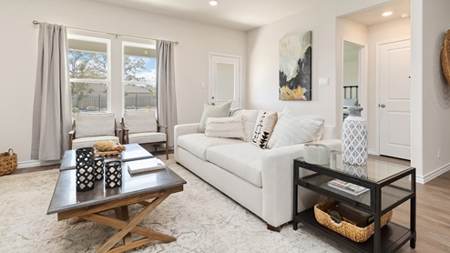 living room with hard surface flooring and large windows