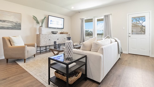 living room with hard surface flooring and large windows