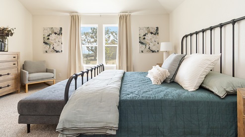primary bedroom with large windows