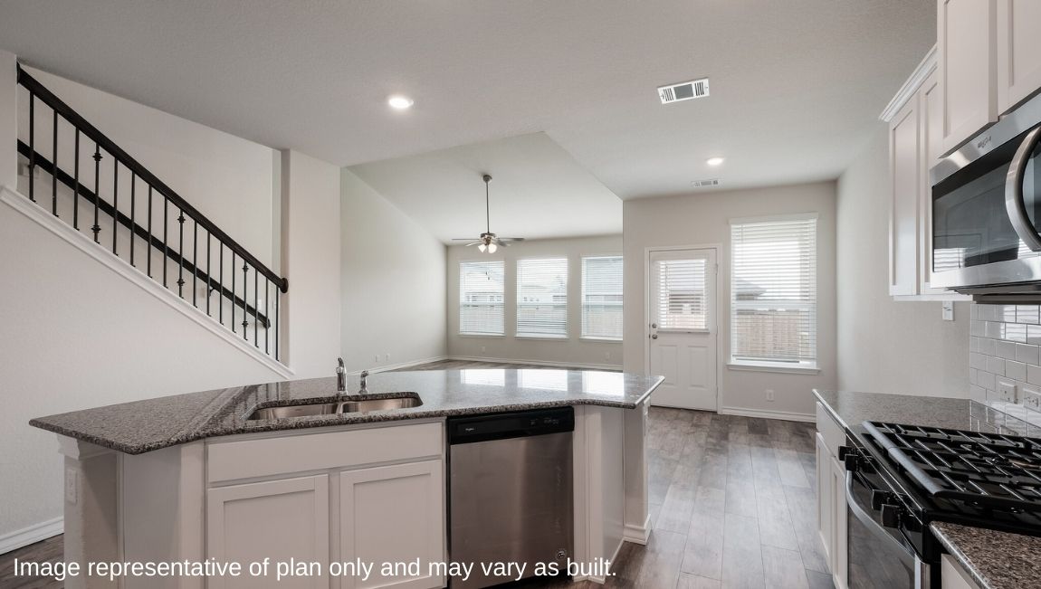 View from kitchen to the living, dining and backyard areas, delivering our fresh open design Brookstone Creek