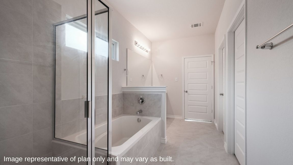 Owner’s ensuite adds a spa-inspired ensuite, walk-in shower, double vanity designed for functional privacy Brookstone Creek