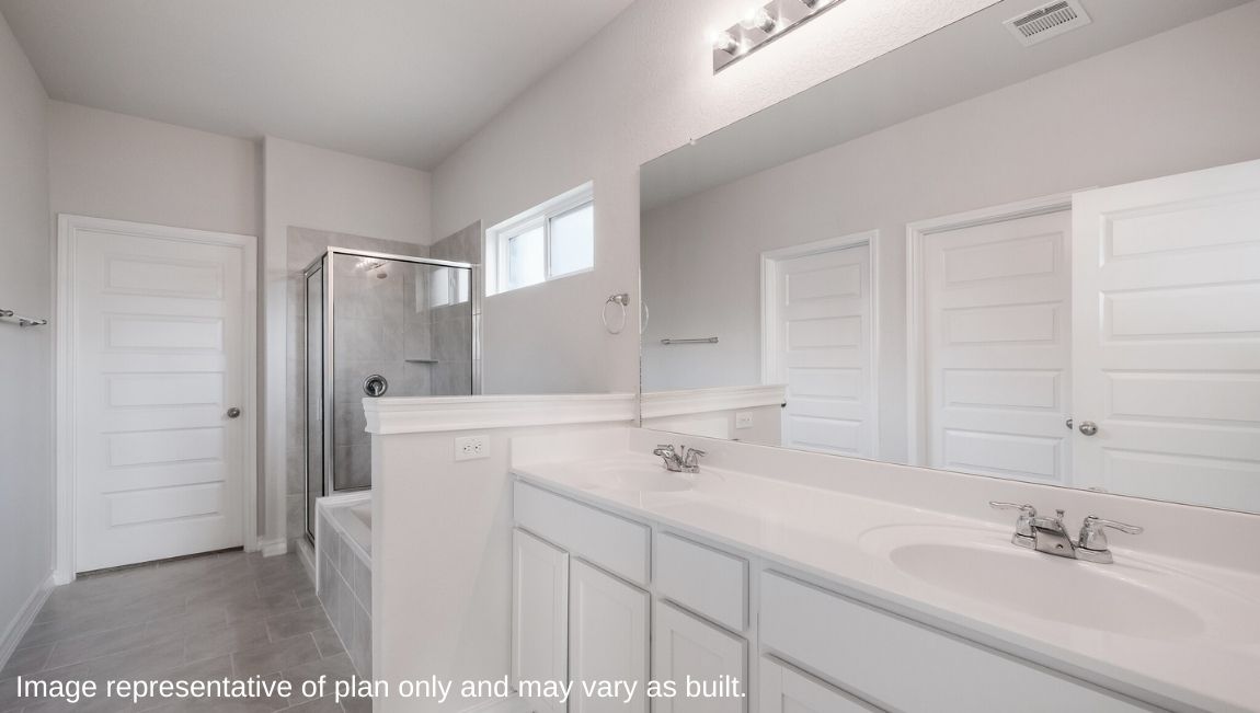 Owner’s ensuite adds a spa-inspired ensuite, with tub, designed with flair style Brookstone Creek