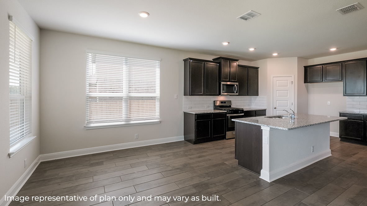 blended breakfast nook and kitchen with hard surface flooring throughout