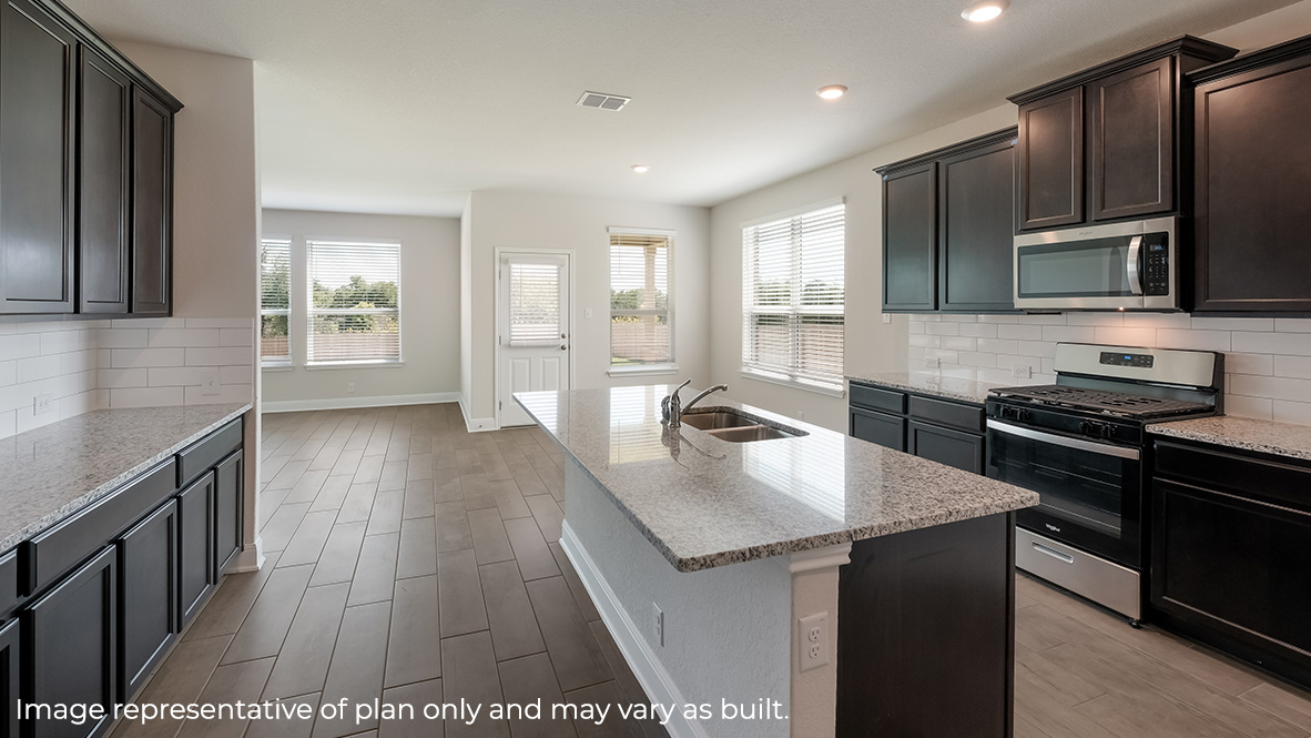 blended kitchen, breakfast nook and living room