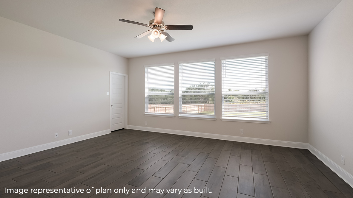living room with large windows and hard surface flooring